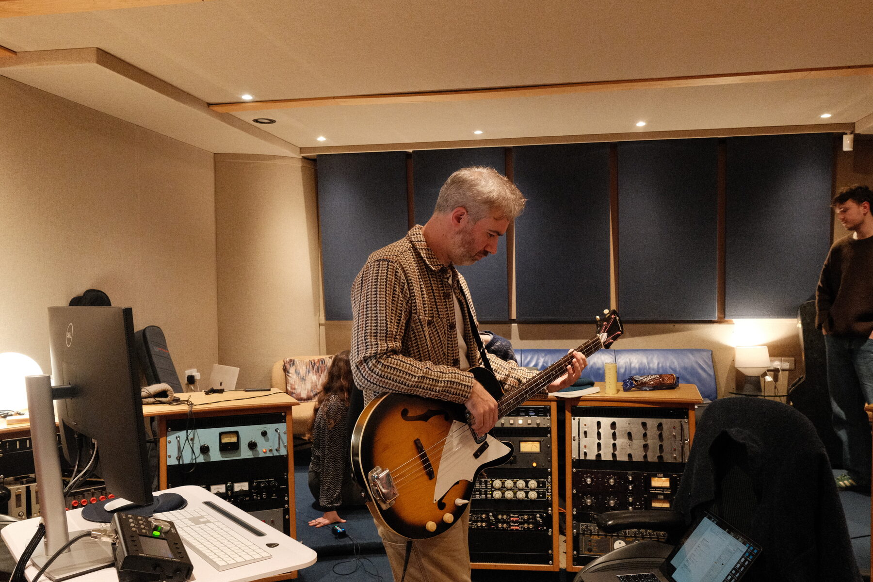Euan Burton in the studio with bass
